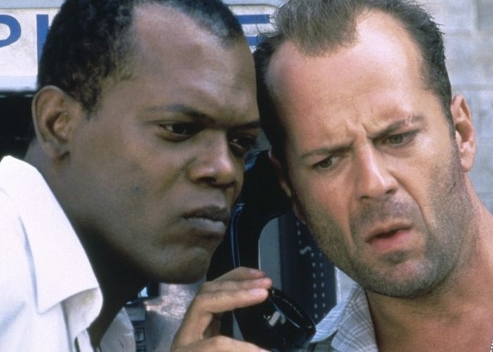 two men pictured listening to a phone call, from then movie diehard